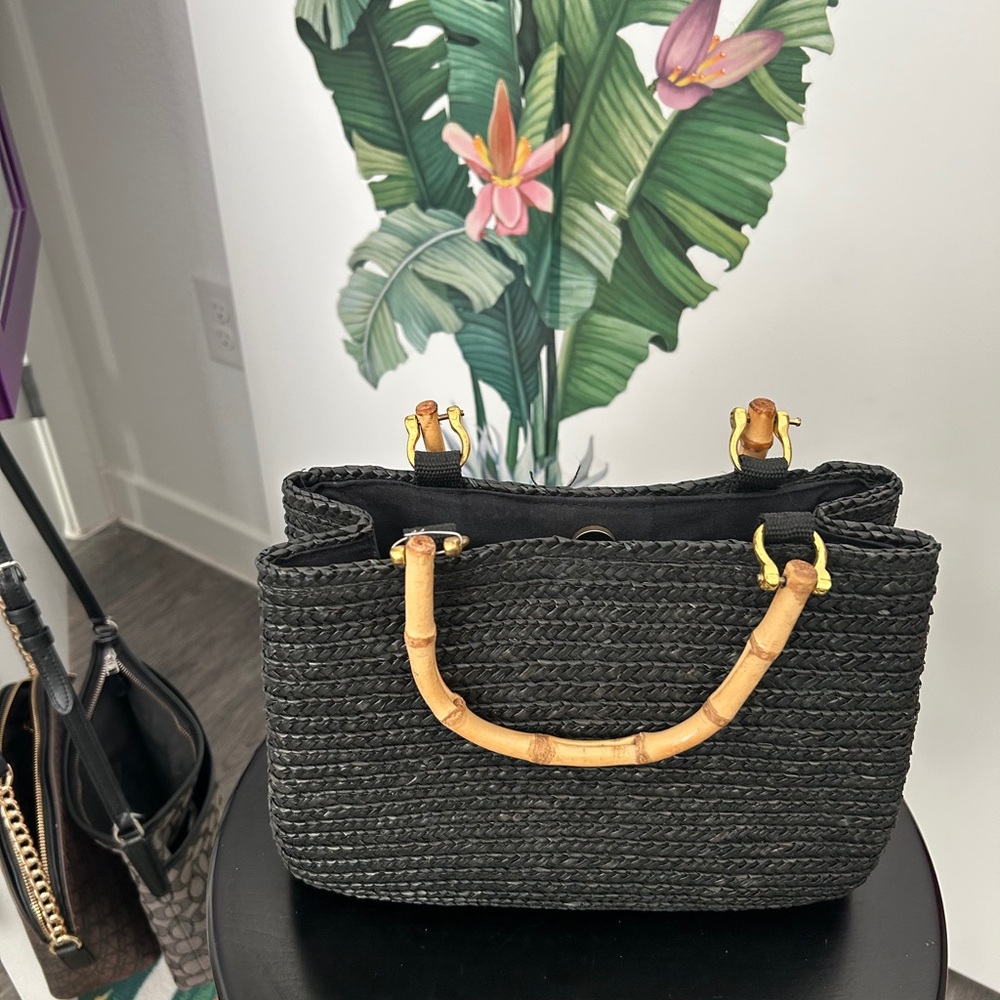 Elegant Black Woven Handbag with Bamboo Handles